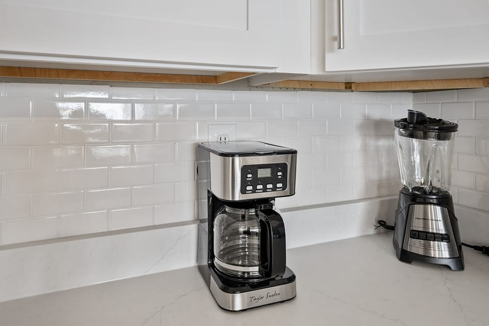 Start your mornings right with premium coffee maker and blender ready for your perfect breakfast blend.