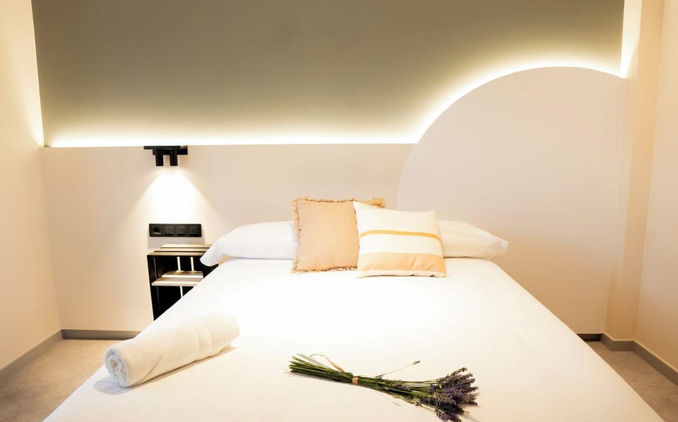 Premium bedding, down comforters, desk, laptop workspace
