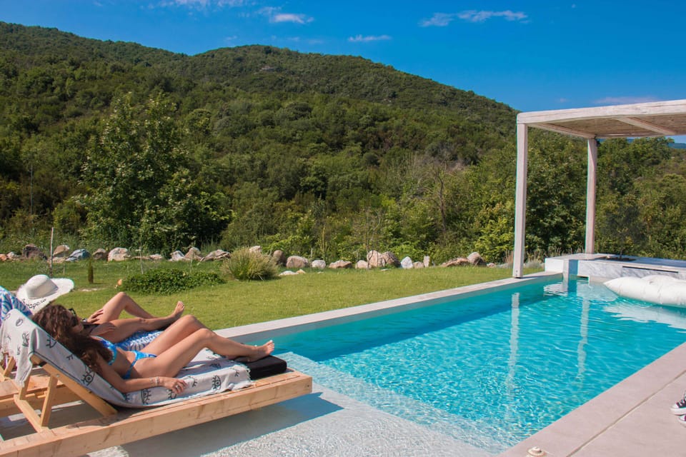 Sunbed deck beside the private pool
Stretch out and soak up the sun on our comfortable loungers, steps from the water with uninterrupted natural views.