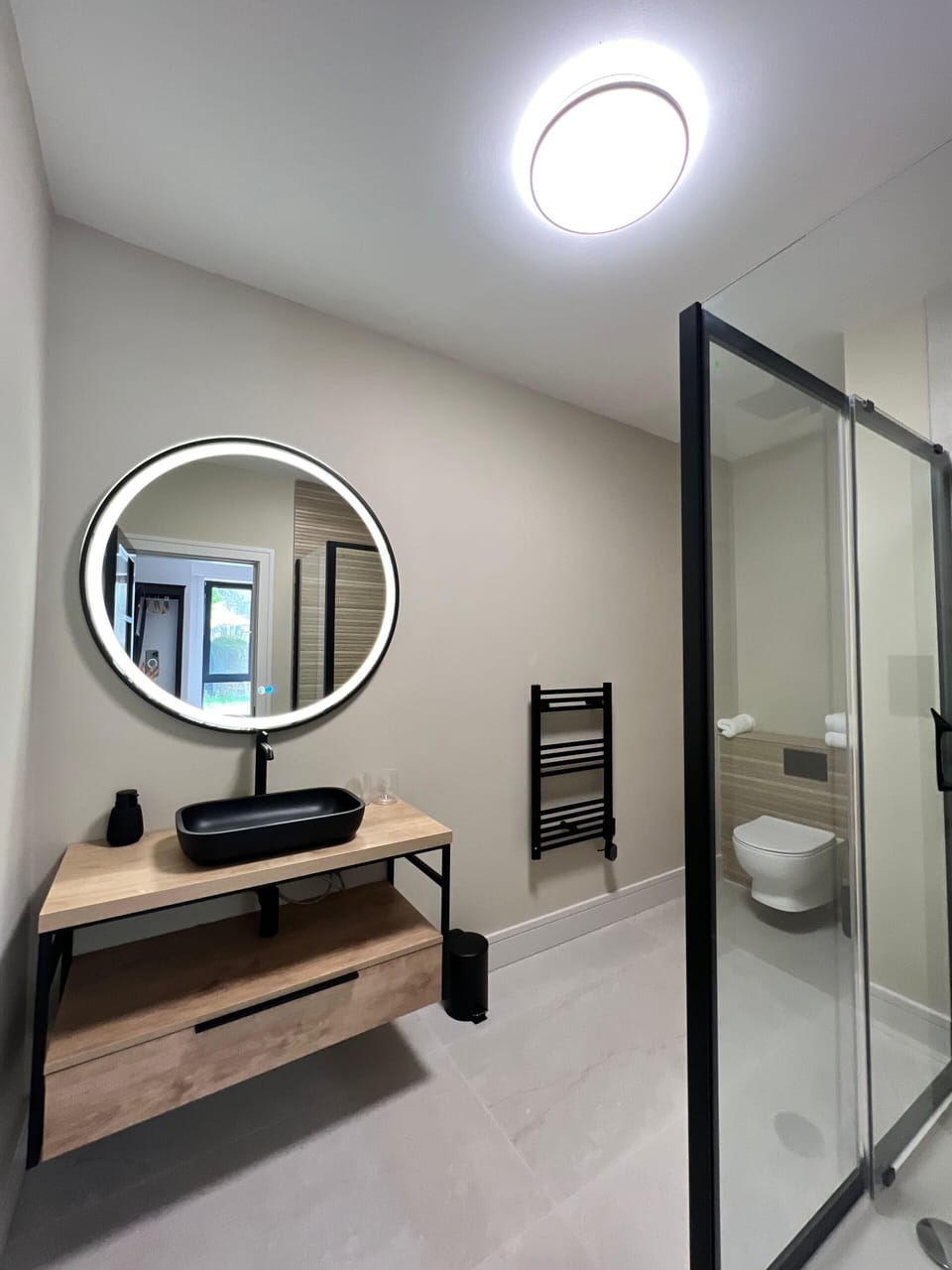 Shower, rainfall showerhead, designer toiletries, hair dryer