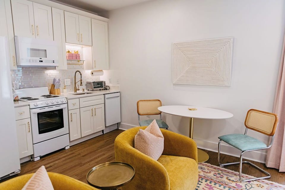Eat in kitchen with fridge, microwave, oven, range, dishwasher, & toaster oven.