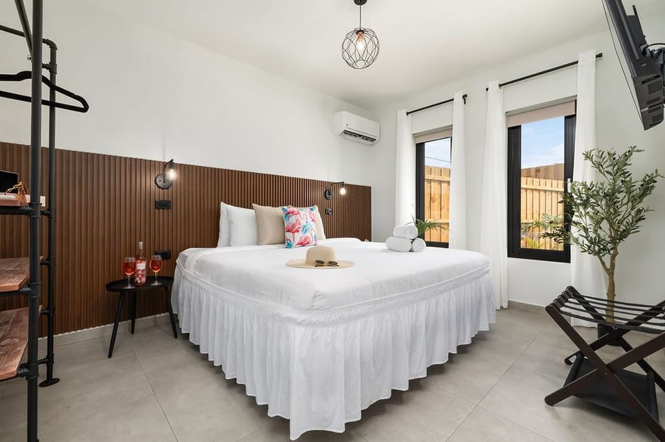 Stay in and unwind! Our bedroom is your cozy haven, complete with a comfortable bed, TV for entertainment, and AC for a blissful night's sleep.