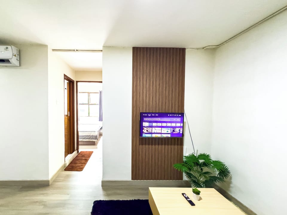 Standard Apartment | Living area | 43-inch Smart TV with cable channels, Netflix, streaming services