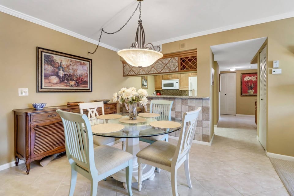 Enjoy a meal or card games gathered around the dining table for 4.