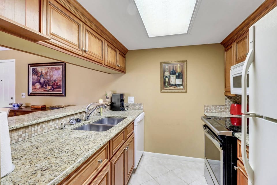 The kitchen is equipped with full size appliances, and all cookware, dinnerware and many kitchen tools.