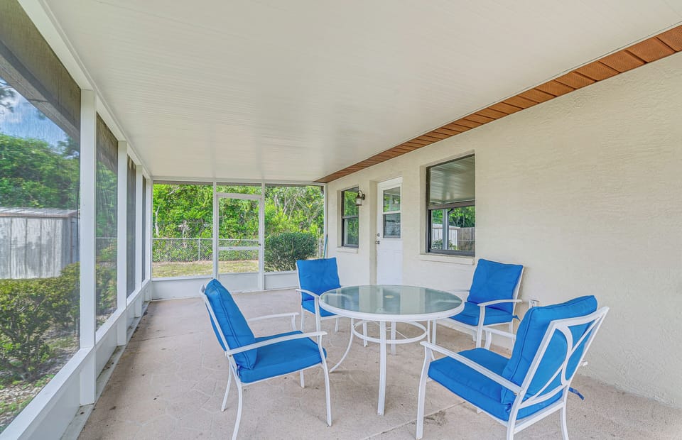 Lanai | Outdoor Dining Area | Fenced Backyard
