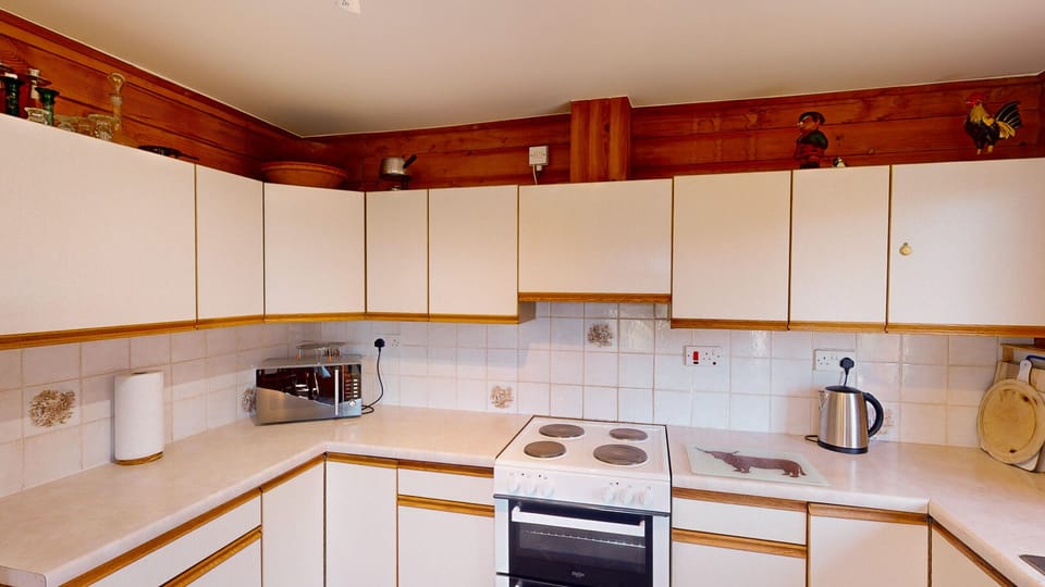 Kitchen with dishwasher and electric oven