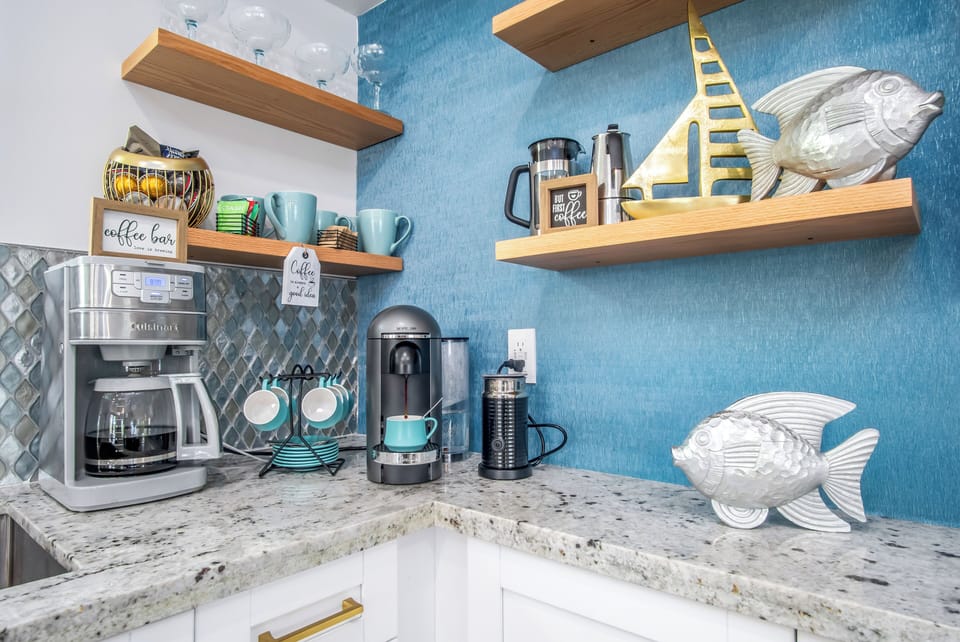 Did someone say coffee dreams? Nespresso Virtuoso, coffee pot, French Press, Cuban Coffee Maker, Frother, regular and decaf coffee and Nespresso pods, tea bags, sugar all provided.