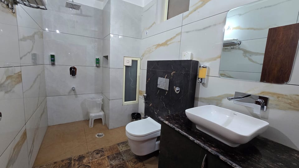 Shower, towels, soap, shampoo