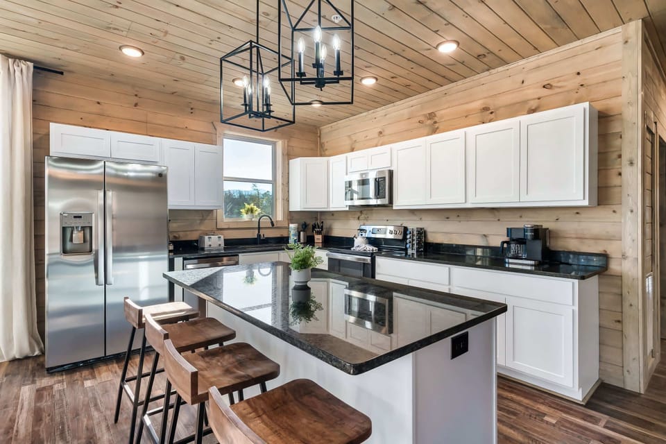 Modern elegance awaits in this spacious kitchen, perfect for culinary adventures!