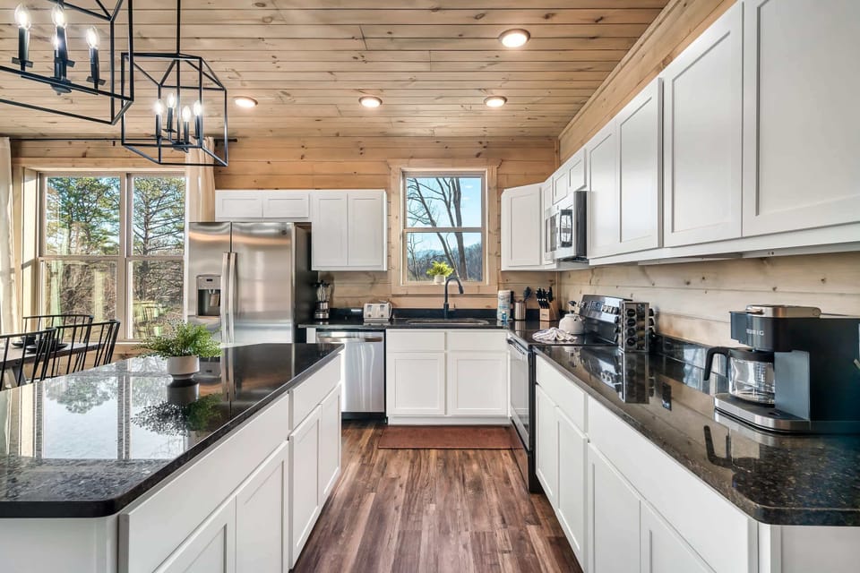 Whip up delicious meals in this sunlit space with modern appliances and elegant decor!