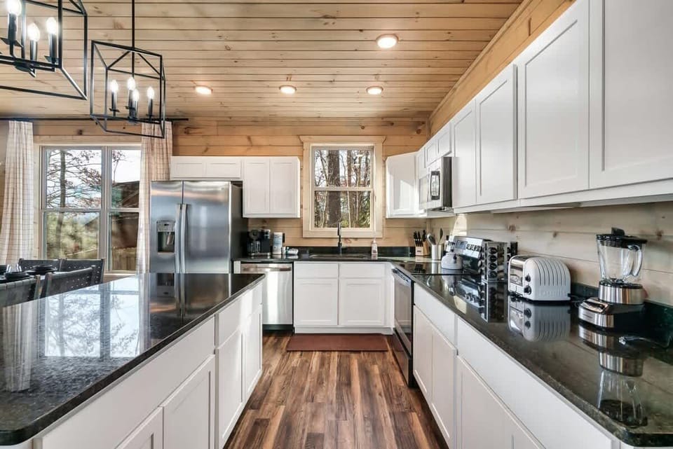 Sleek countertops & modern appliances await your culinary adventures!