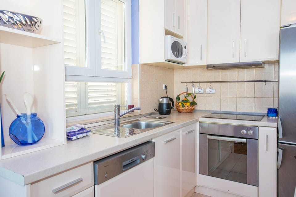 Apartment (Two Bedroom Apartment with Balcony an) | Private kitchen | Fridge