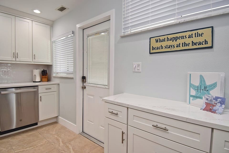 Enter through the kitchen or living room