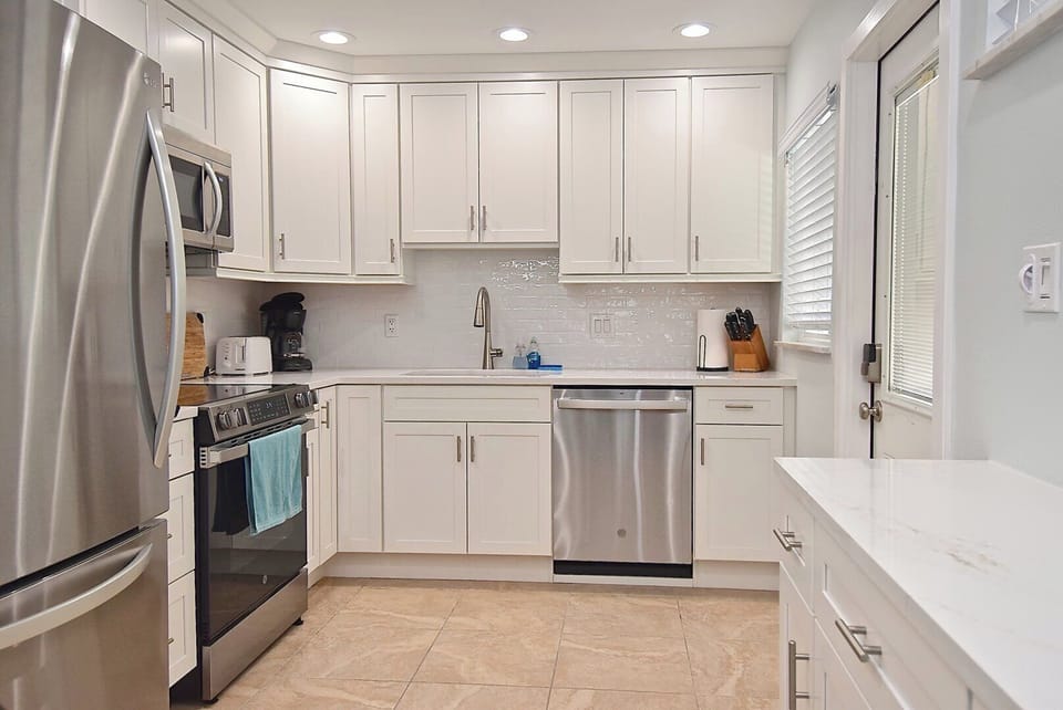 Well stocked kitchen with all new cabinets & appliances