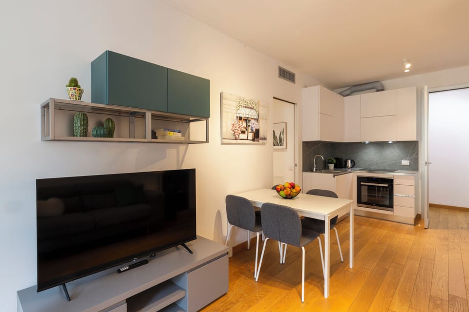 City Apartment | Living area | 50-inch Smart TV with digital channels