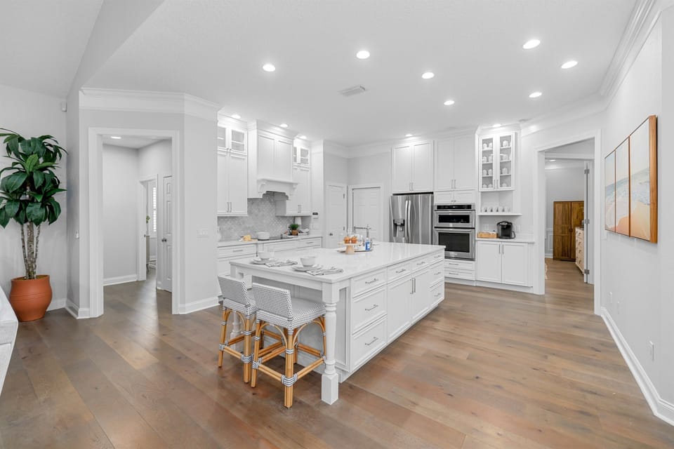 Spacious chef’s kitchen with oversized island, perfect for cooking, gathering, and entertaining