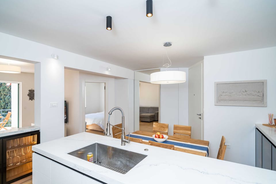 Apartment (Three Bedroom Apartment with Balcony) | Private kitchen | Fridge