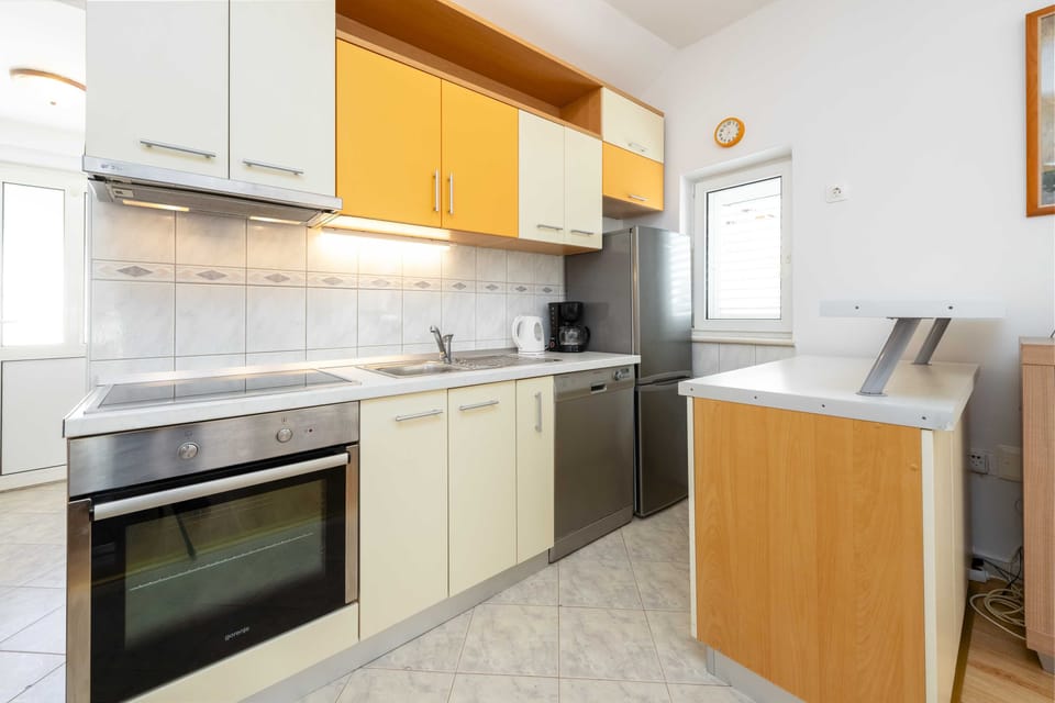 Apartment (One Bedroom Apartment with Balcony an) | Private kitchen | Fridge