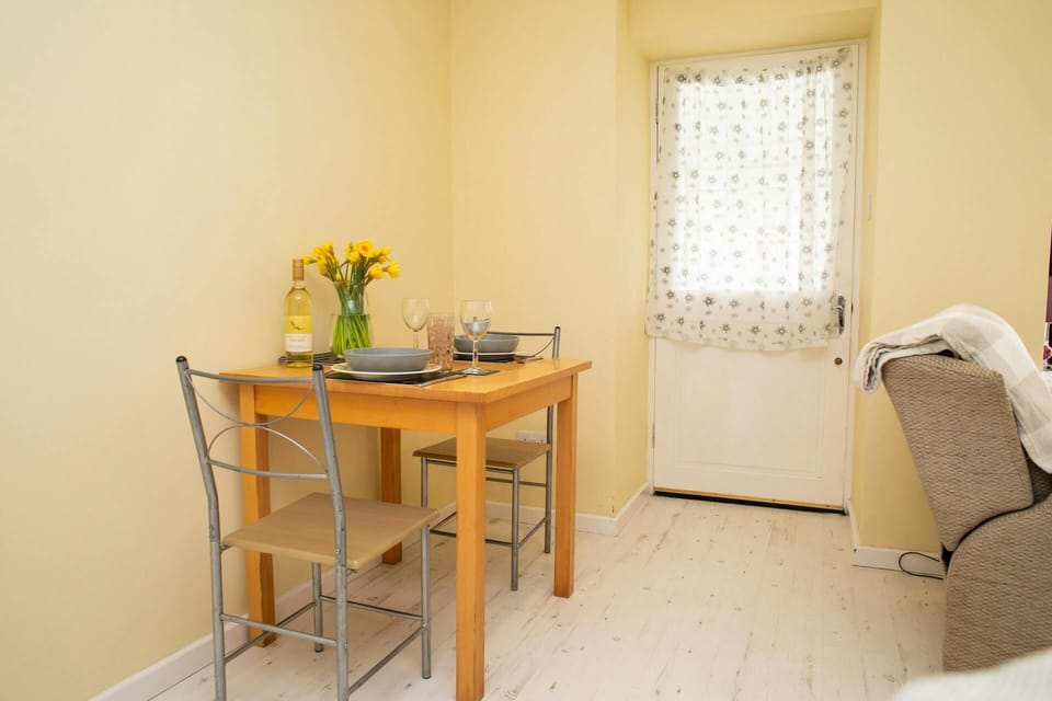 Small dining table with two chairs