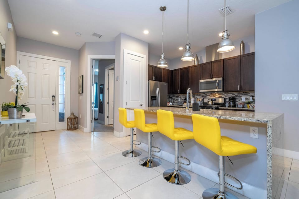 Spacious kitchen with granite counters and everything you need