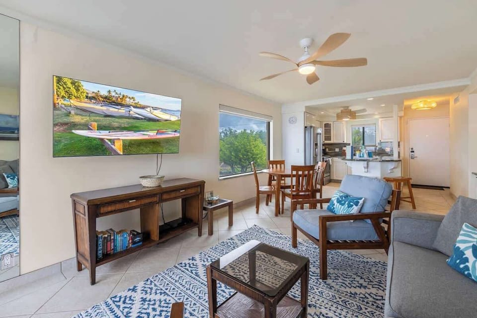 Beautiful coastal aesthetic with sofa sleeper, central AC, ceiling fan, and smart TV with cable