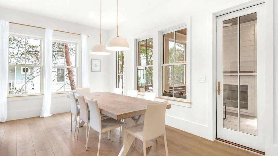 Extra long dining table. Seating for 8 with 3 additional bar seats.