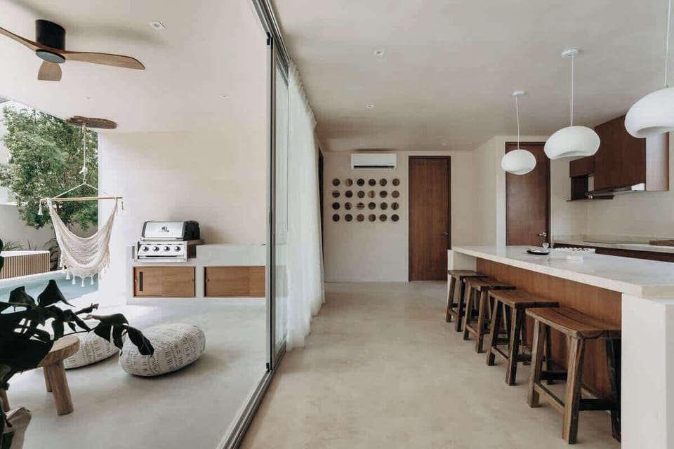 Kitchen open to outdoor patio