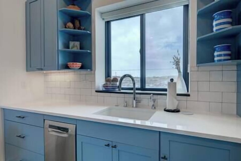 Ample counter space and a dishwasher make meal prep easy and enjoyable!