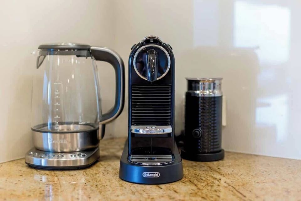 Get your early morning caffeine fix and whip up a coffee making use of the Nespresso pod machine.