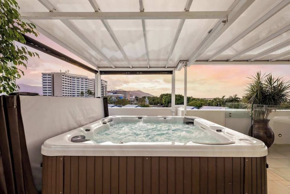 Unwind in the private hot tub while gazing at the scenery.