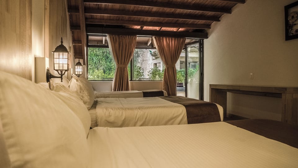 Premium bedding, down comforters, blackout drapes, WiFi (free)