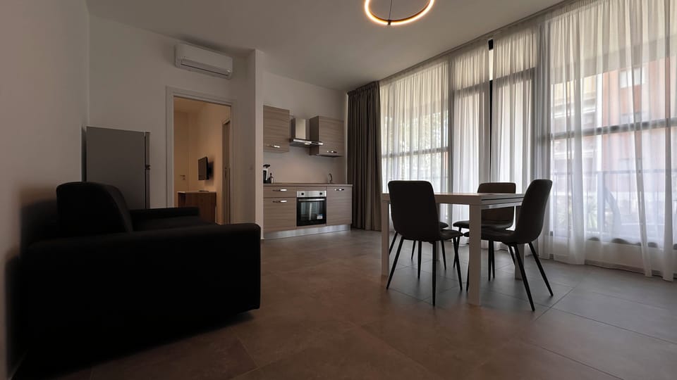 Deluxe Apartment | Living area | Smart TV