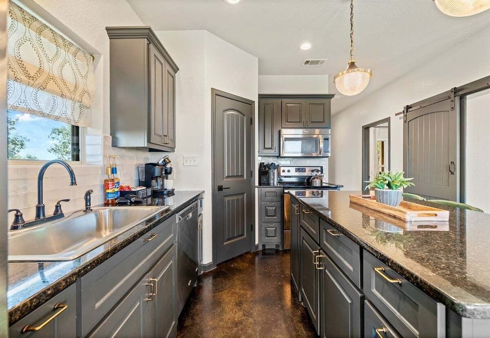 Whether you're making breakfast or hosting a dinner party, this stylish kitchen has everything you need.