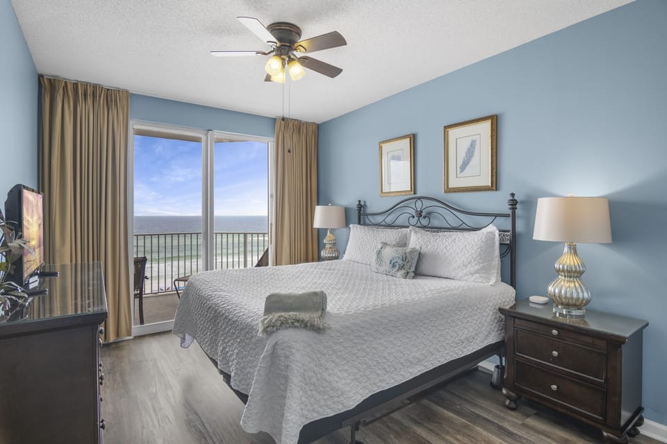 Big Gulf views from the primary bedroom which features a King Bed, Smart TV, large closet, and private bathroom with dual vanity