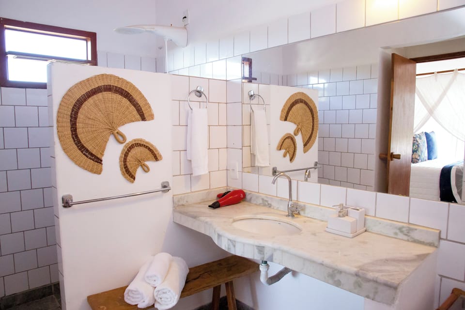 Executive Suite, Lanai, Garden View | Bathroom | Hair dryer (on request), towels, soap, shampoo