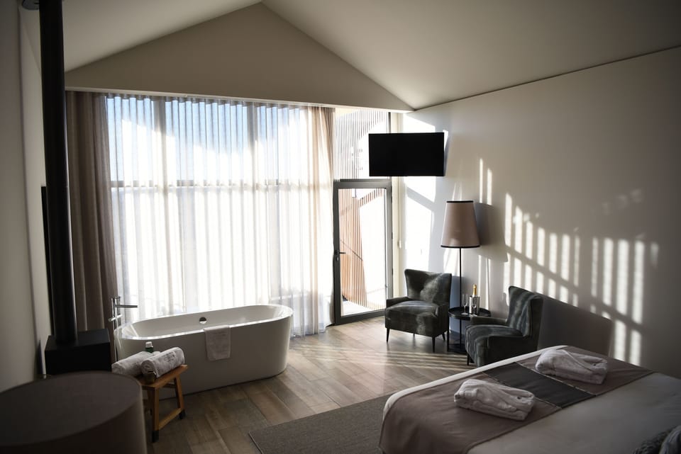 Deluxe Double Room, 1 King Bed | Individually decorated, individually furnished, desk, blackout drapes