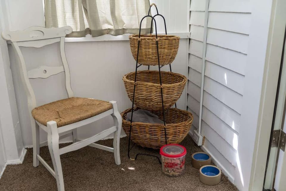  Thoughtful pet-friendly corner with treats and essentials for furry guests ✨