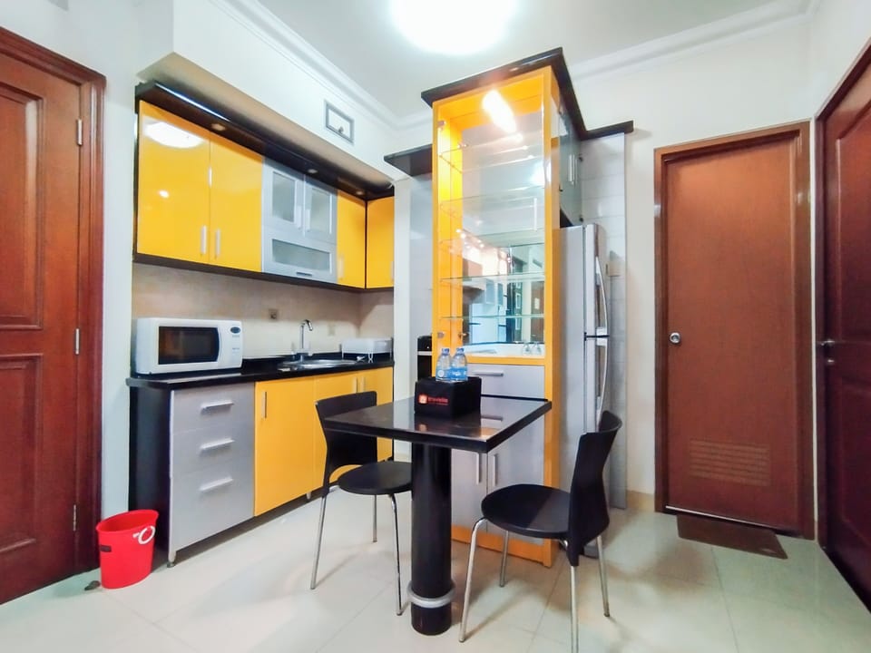 Apartment | Private kitchen | Full-size fridge, microwave, stovetop, electric kettle