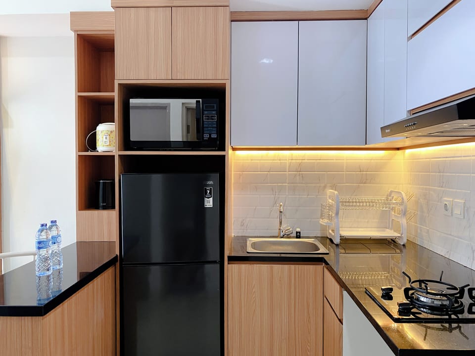Apartment | Private kitchen | Full-size fridge, microwave, stovetop