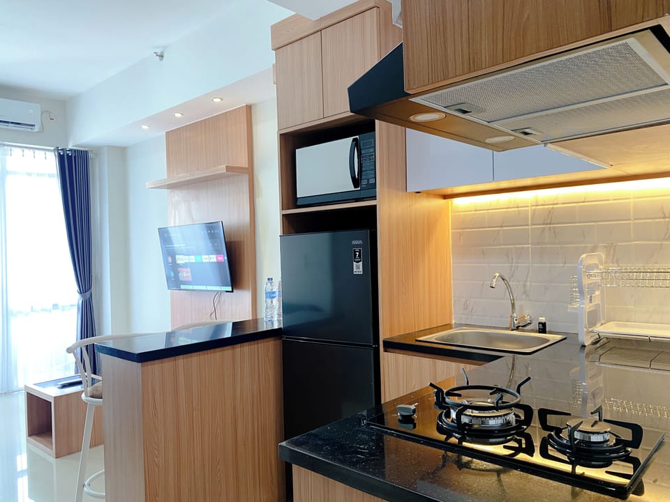 Apartment | Private kitchen | Full-size fridge, microwave, stovetop