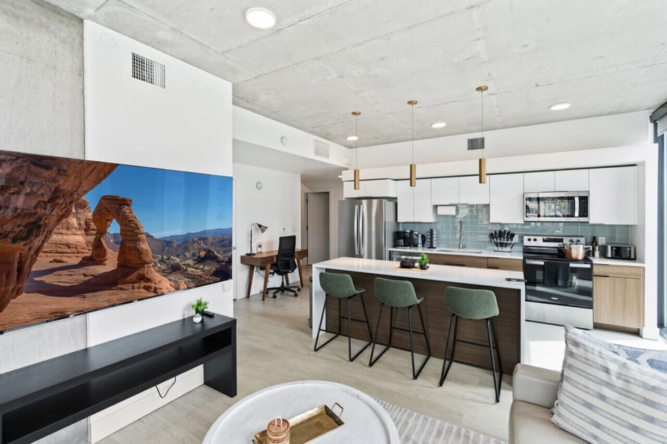 75` TV in open kitchen  and living room!