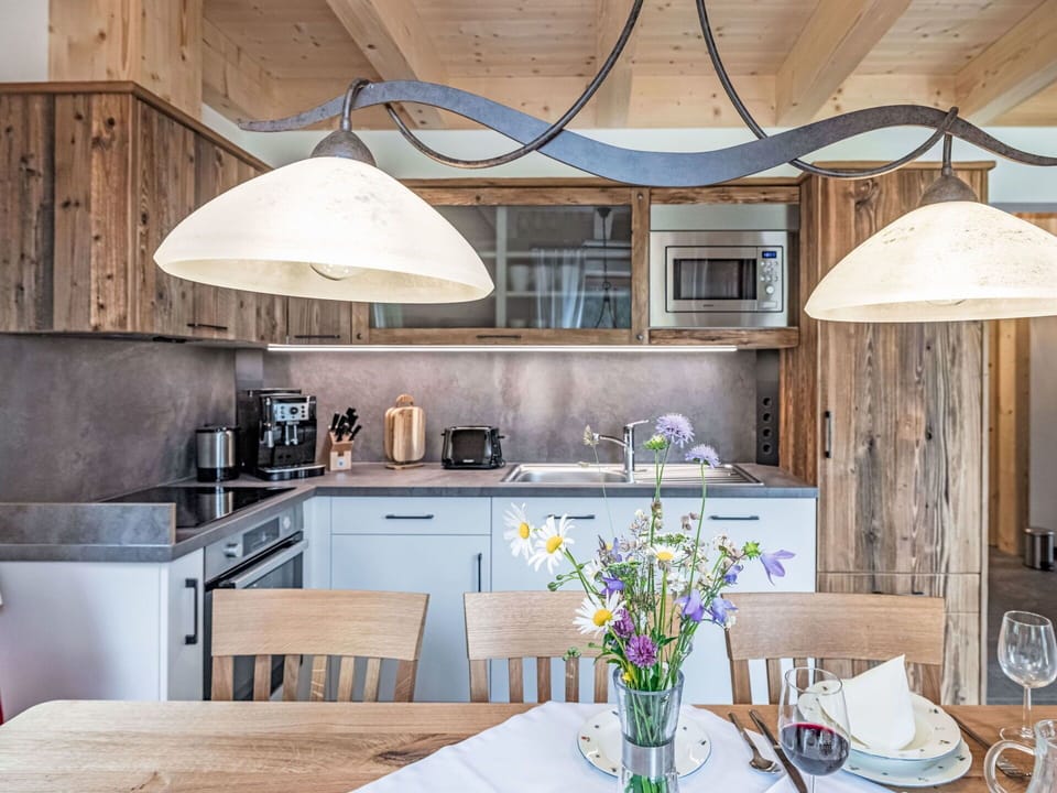 Table, Countertop, Furniture, Property, Cabinetry, Tableware, Kitchen, Interior Design, Lighting, Wood