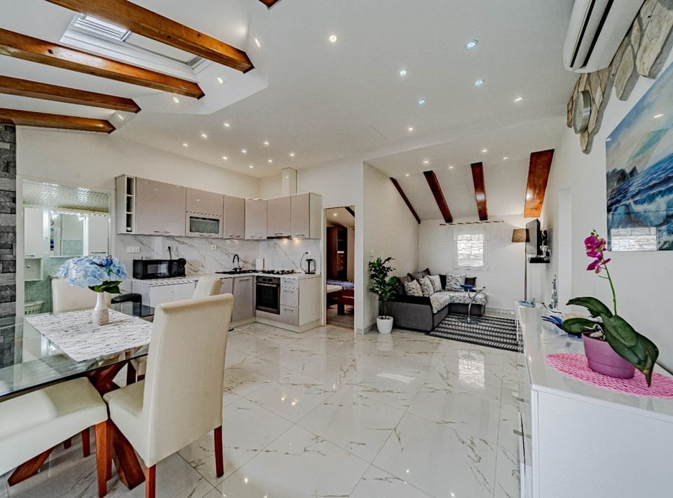 House (Stone House Blaca - Two Bedroom Stone) | Living room | 32-inch flat-screen TV with cable channels