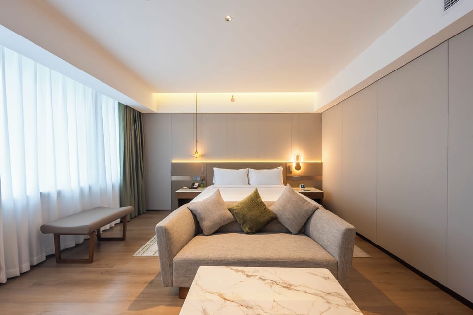 Premium bedding, down comforters, in-room safe, desk