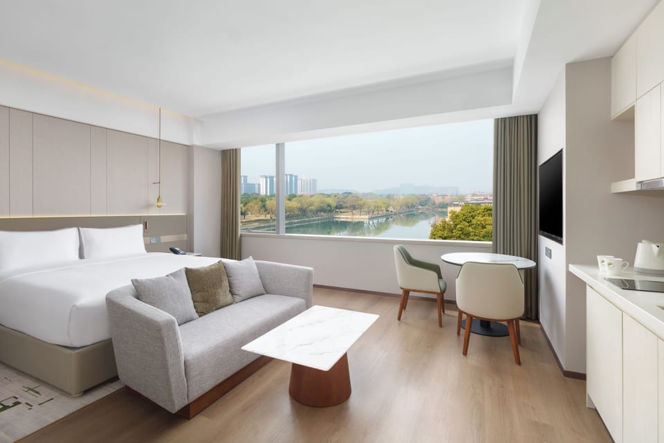 Premium bedding, down comforters, in-room safe, desk