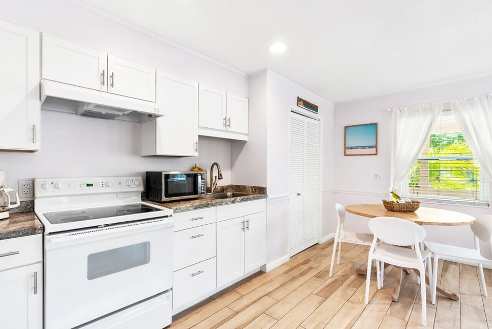 Full kitchen with dishware, cookware, & silverware