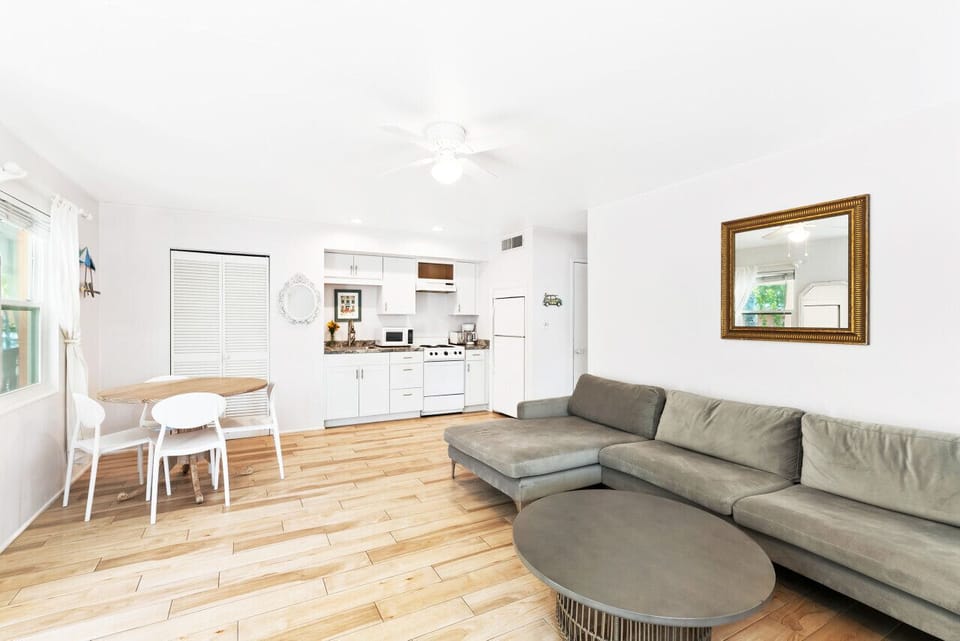 Open floor plan living room with dining area
