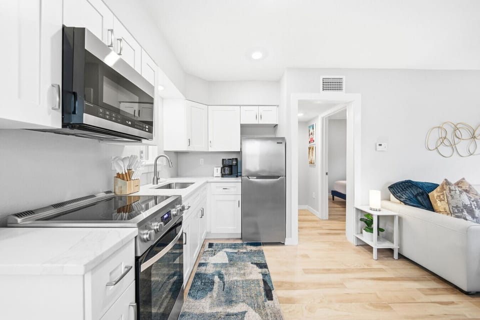 Coquina`s kitchen w/ dish, silver, & cookware
