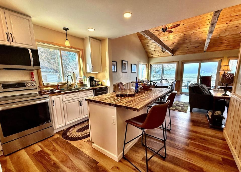Well-equipped kitchen with cooking essentials and dishwasher.